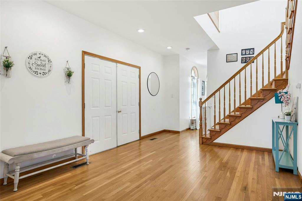 40 Horseneck Road Montville, NJ 07045 - Photo 29 of 47 a view of a hallway with wooden floor and entryway