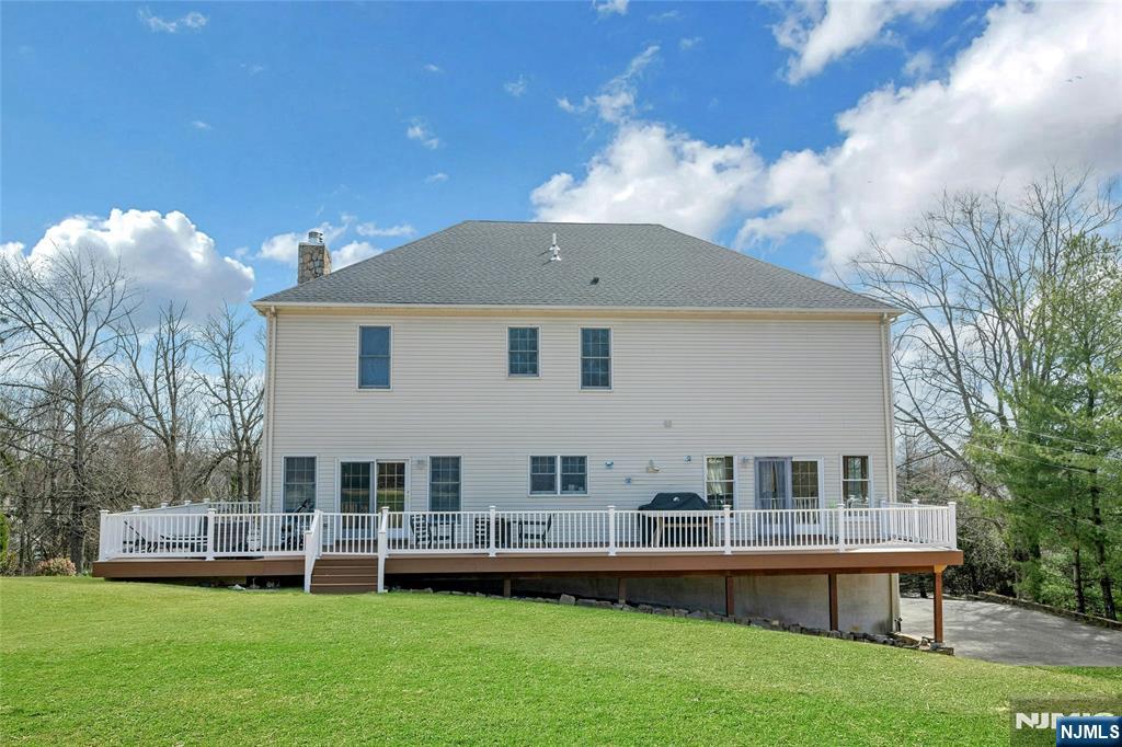 40 Horseneck Road Montville, NJ 07045 - Photo 35 of 47 a aerial view of a house with a yard table and chairs