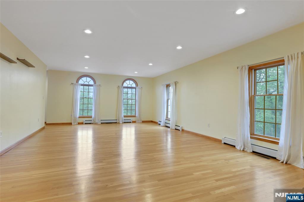 40 Horseneck Road Montville, NJ 07045 - Photo 39 of 47 a view of an empty room with glass door and windows