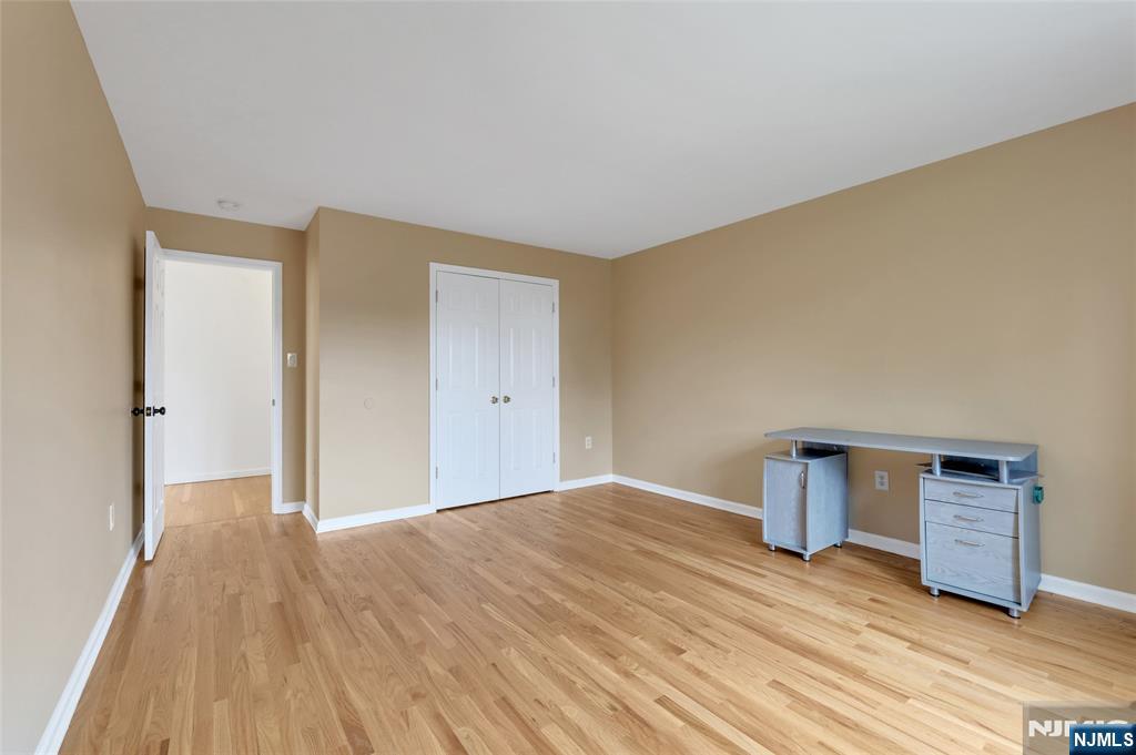 40 Horseneck Road Montville, NJ 07045 - Photo 42 of 47 a view of an empty room and wooden floor