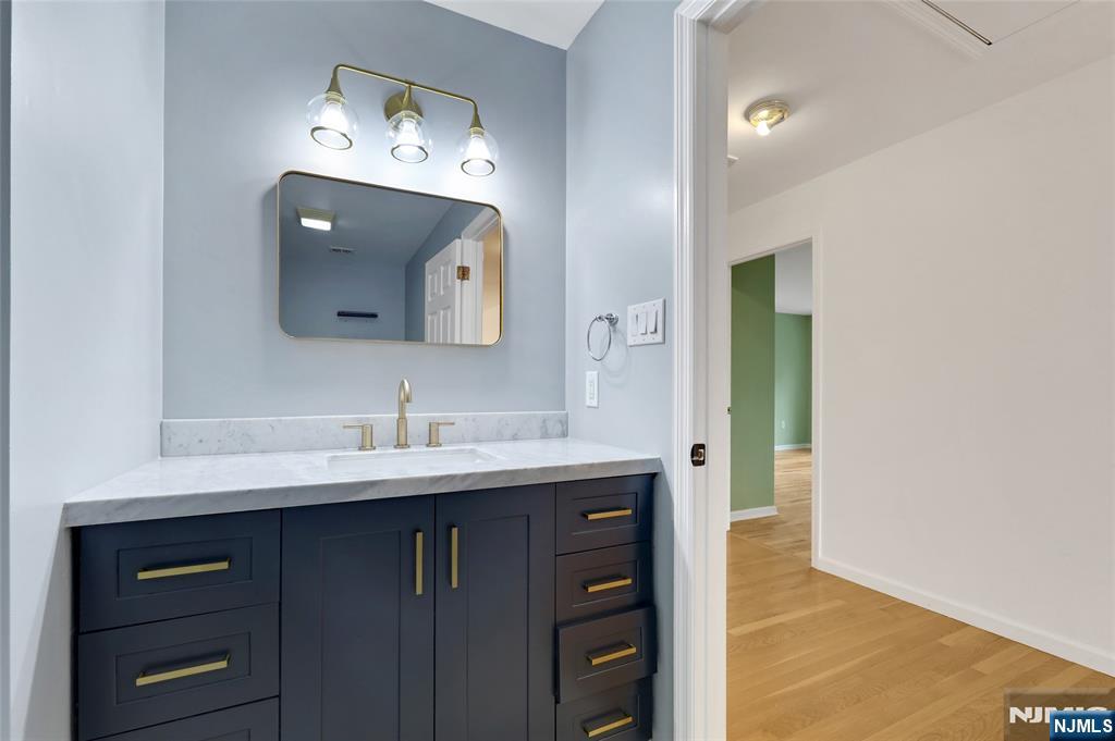 40 Horseneck Road Montville, NJ 07045 - Photo 44 of 47 a bathroom with a sink and a mirror