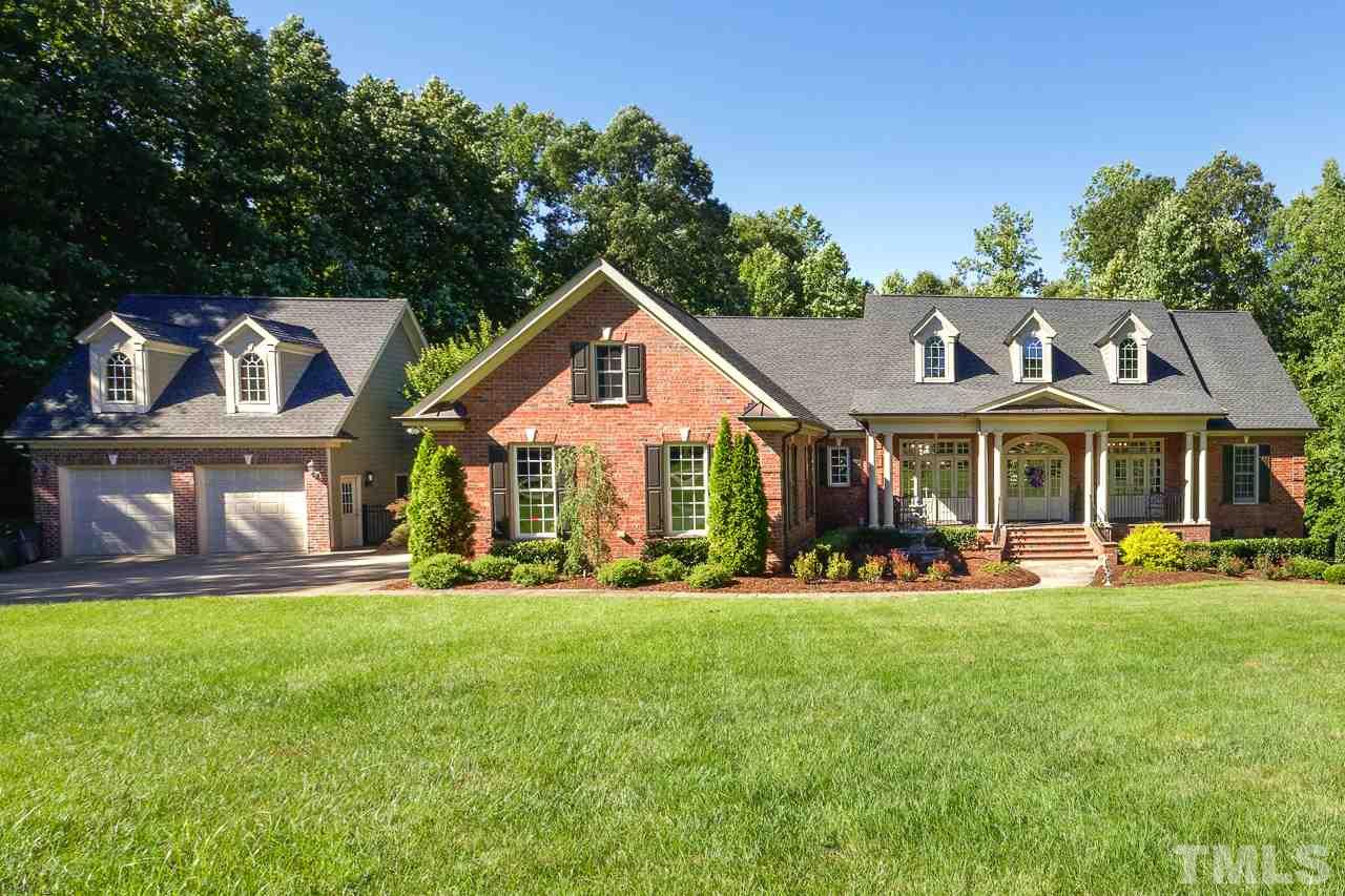 1420 Wynncrest Court Raleigh, NC 27603 - Photo 1 of 30 a front view of a house with a yard