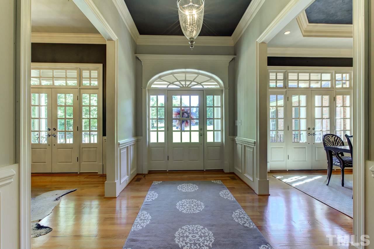 1420 Wynncrest Court Raleigh, NC 27603 - Photo 3 of 30 a view of livingroom with hardwood floor and hallway
