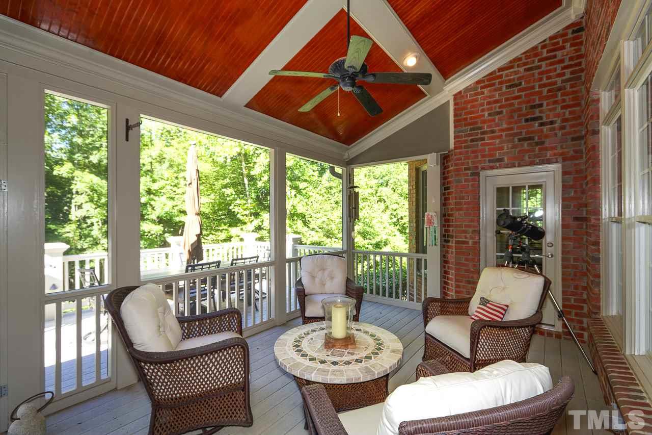 1420 Wynncrest Court Raleigh, NC 27603 - Photo 26 of 30 a living room with patio furniture and a large window