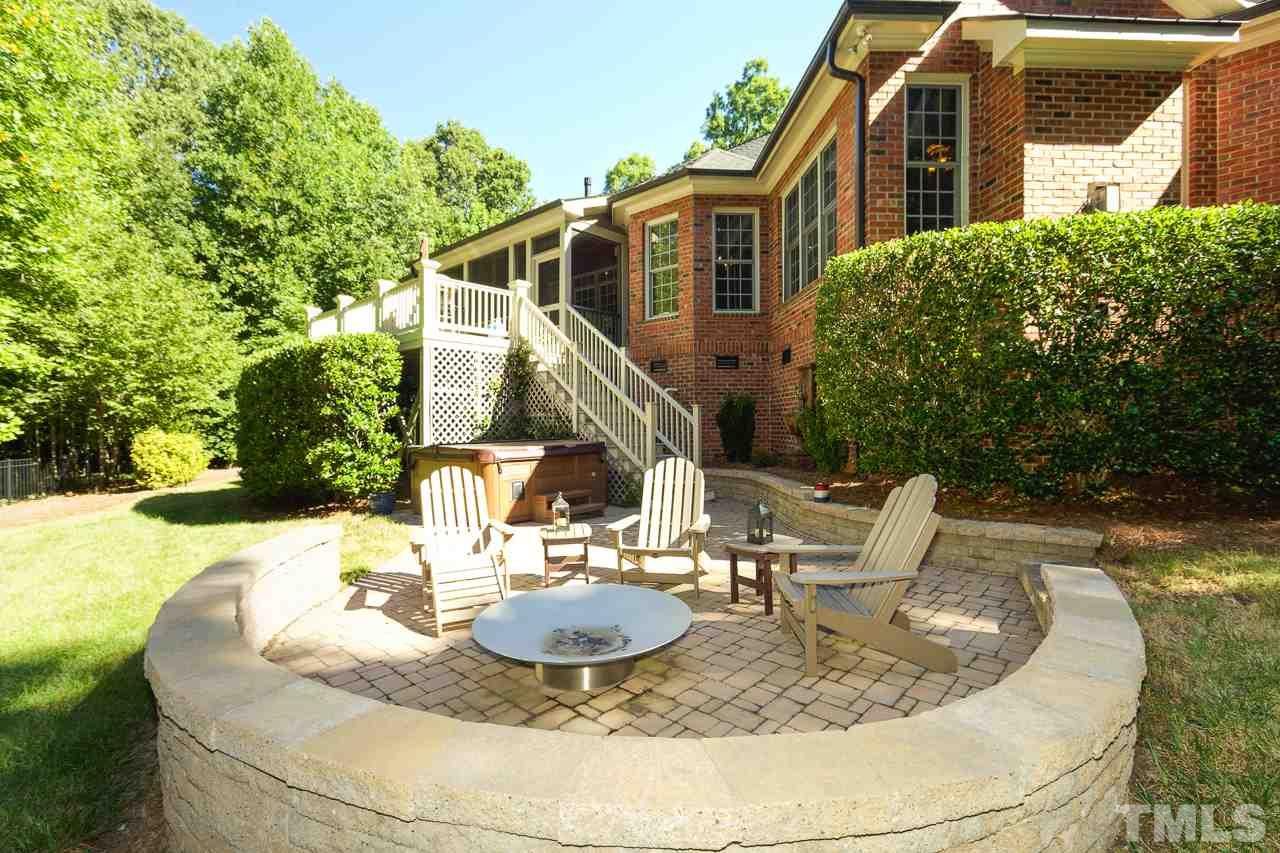 1420 Wynncrest Court Raleigh, NC 27603 - Photo 27 of 30 a view of a house with backyard and sitting area