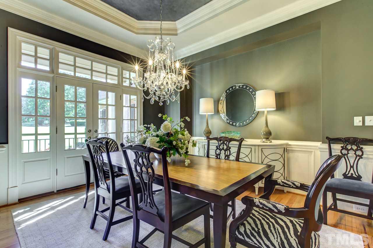 1420 Wynncrest Court Raleigh, NC 27603 - Photo 4 of 30 a view of a dining room with furniture and chandelier