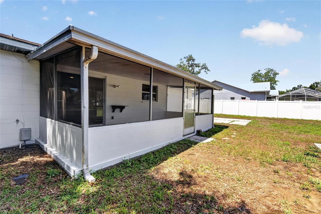 2340 Merrily Circle South Seffner, FL 33584 - Photo 41 of 52 a view of a house with backyard and sitting area