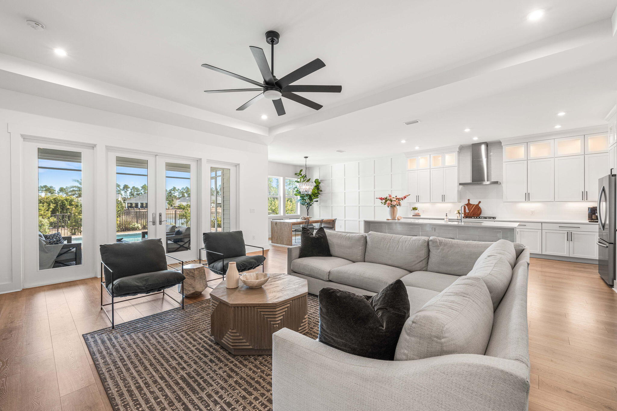 425 Lafayette Road Watersound, FL 32461 - Photo 11 of 52 a living room with furniture and a large window