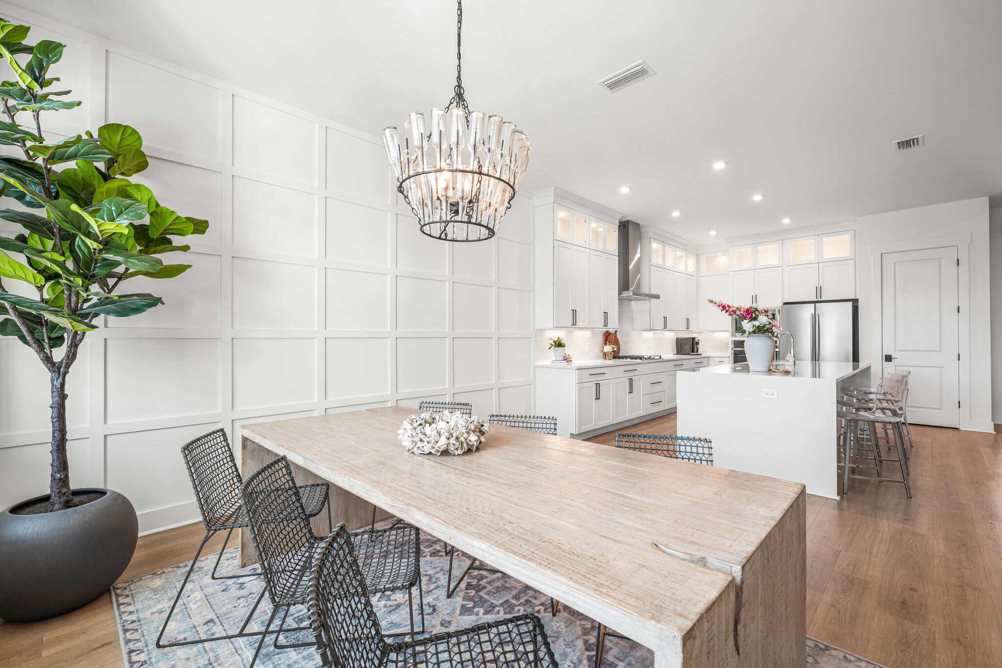 425 Lafayette Road Watersound, FL 32461 - Photo 16 of 52 a view of a dining room with furniture and wooden floor