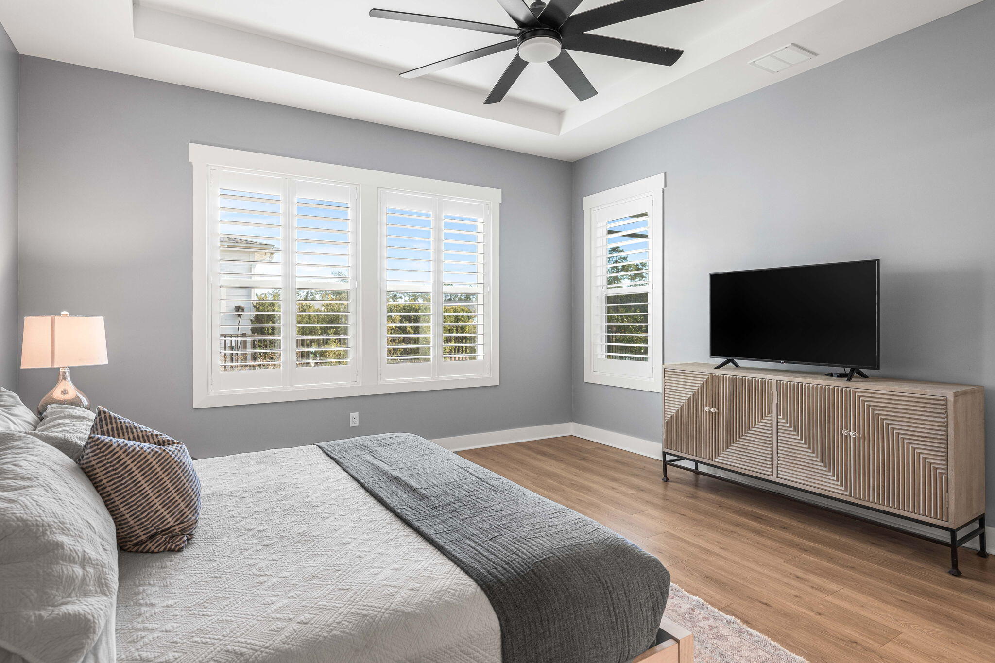 425 Lafayette Road Watersound, FL 32461 - Photo 20 of 52 a bedroom with a bed and a flat screen tv