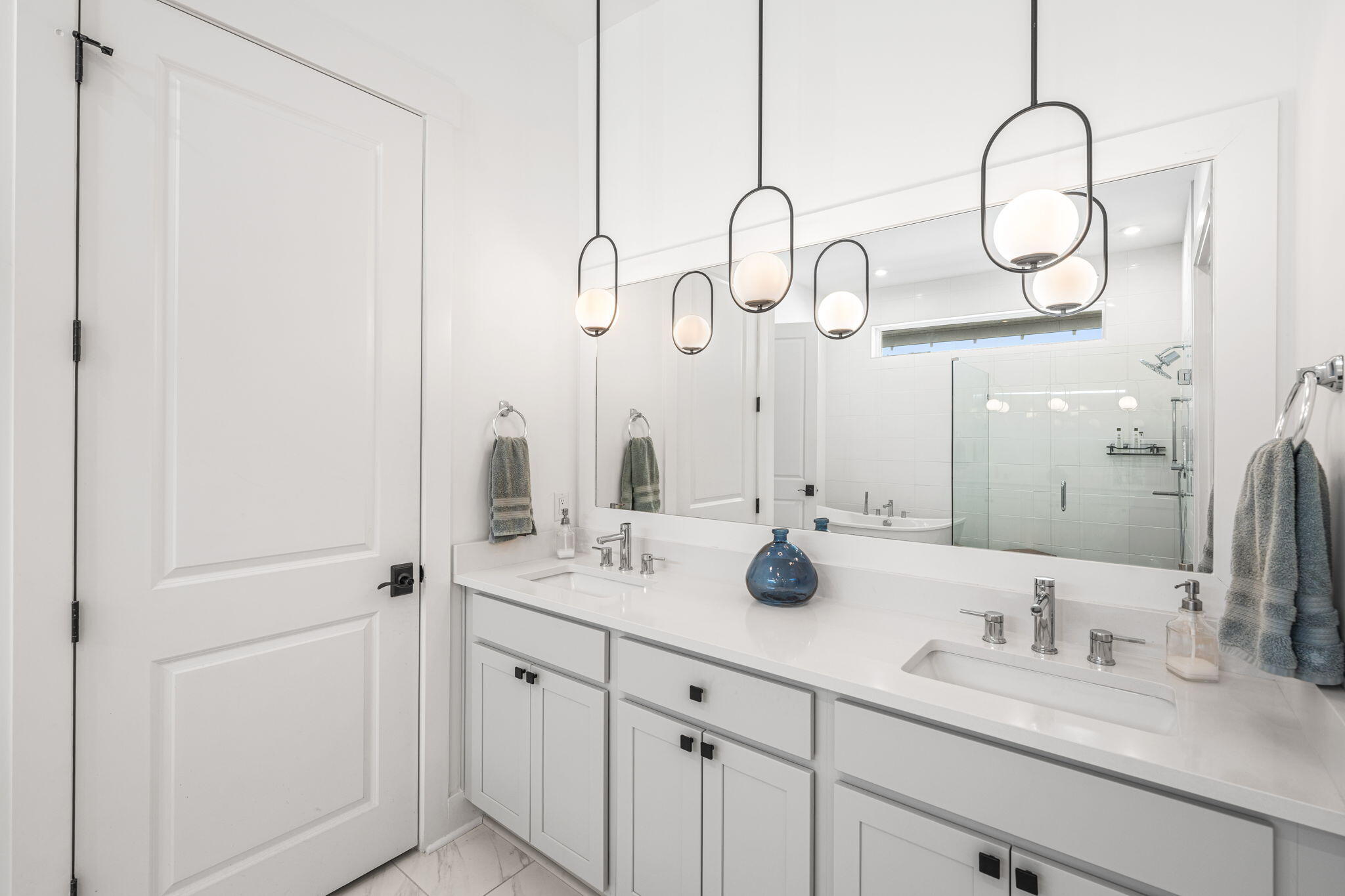 425 Lafayette Road Watersound, FL 32461 - Photo 21 of 52 a bathroom with a double vanity sink and mirror