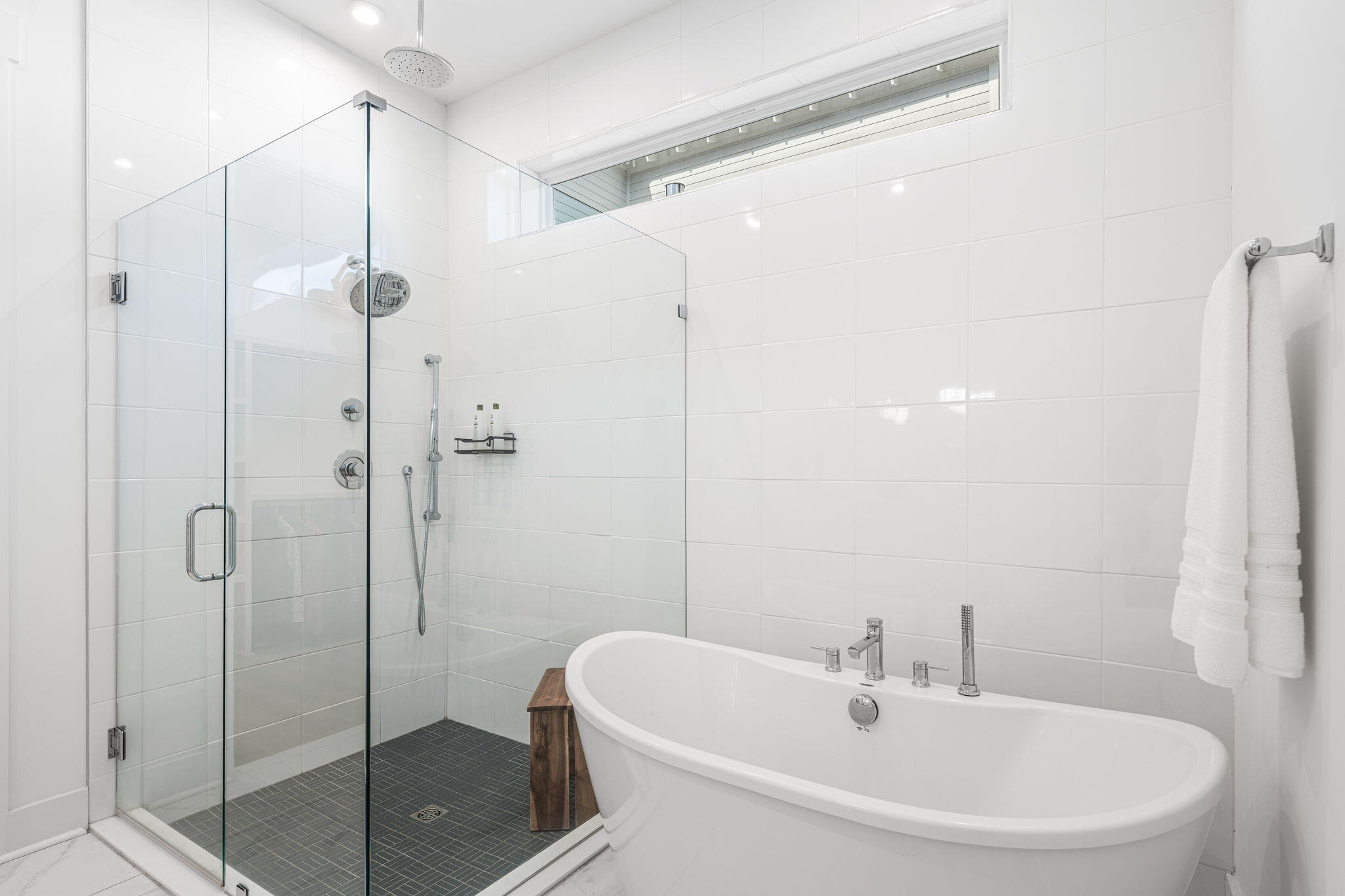 425 Lafayette Road Watersound, FL 32461 - Photo 22 of 52 a white bath tub sitting next to a white sink and a shower