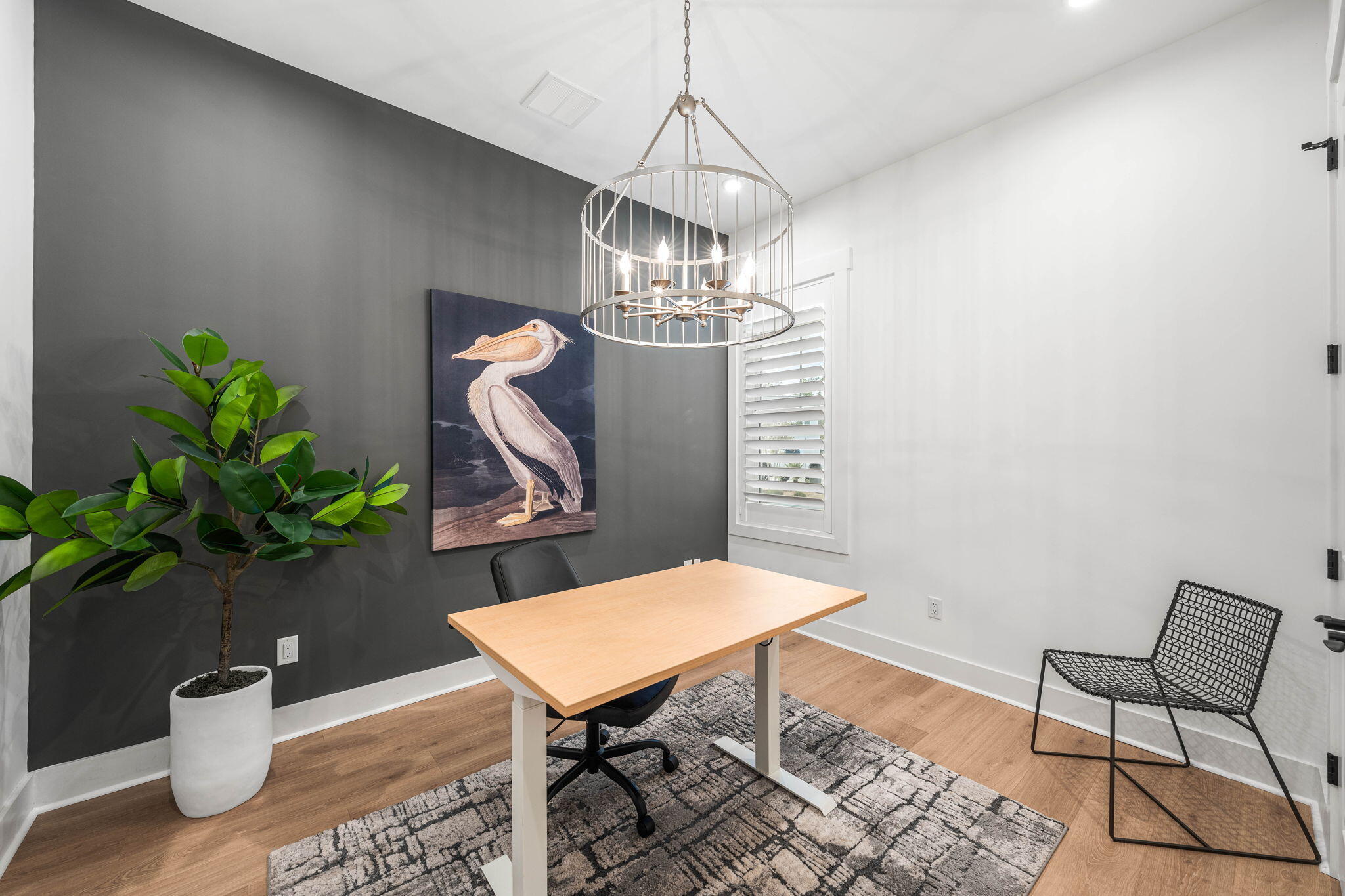 425 Lafayette Road Watersound, FL 32461 - Photo 27 of 52 a view of a dining room with furniture and wooden floor