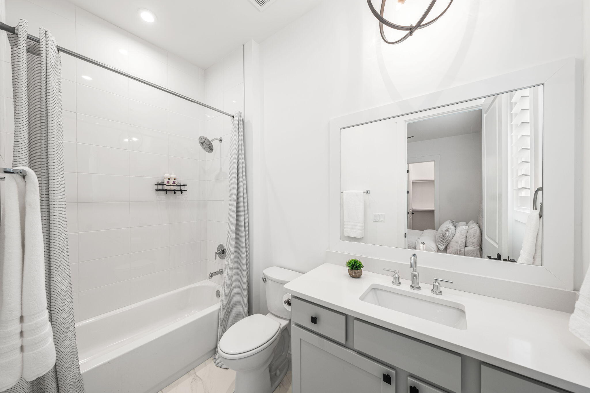 425 Lafayette Road Watersound, FL 32461 - Photo 36 of 52 a bathroom with a sink a toilet and shower