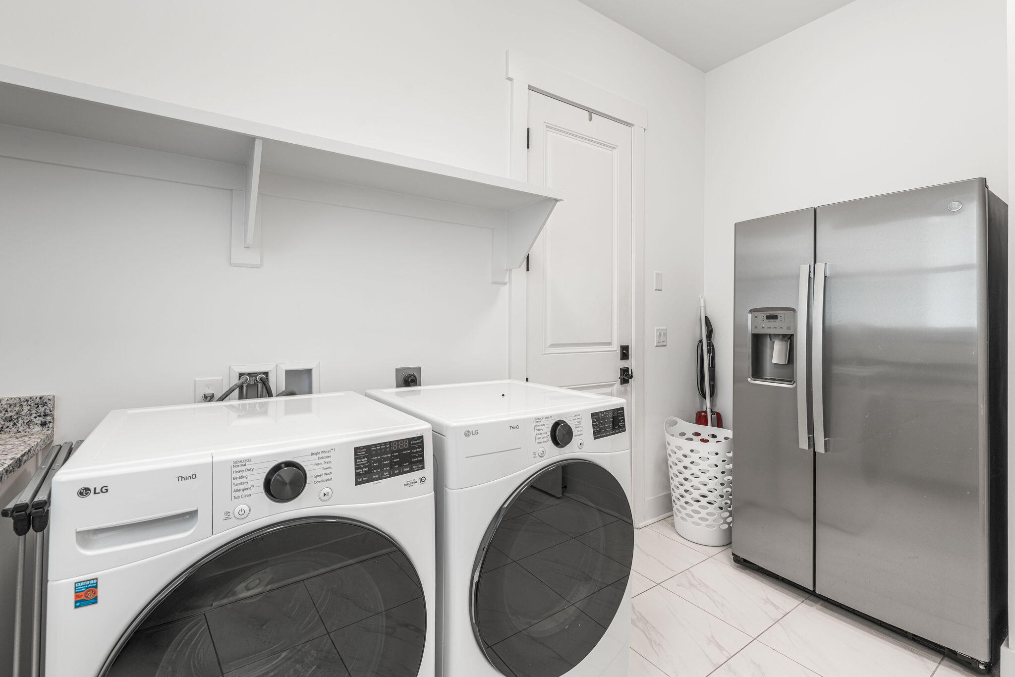 425 Lafayette Road Watersound, FL 32461 - Photo 37 of 52 a utility room with dryer and washer