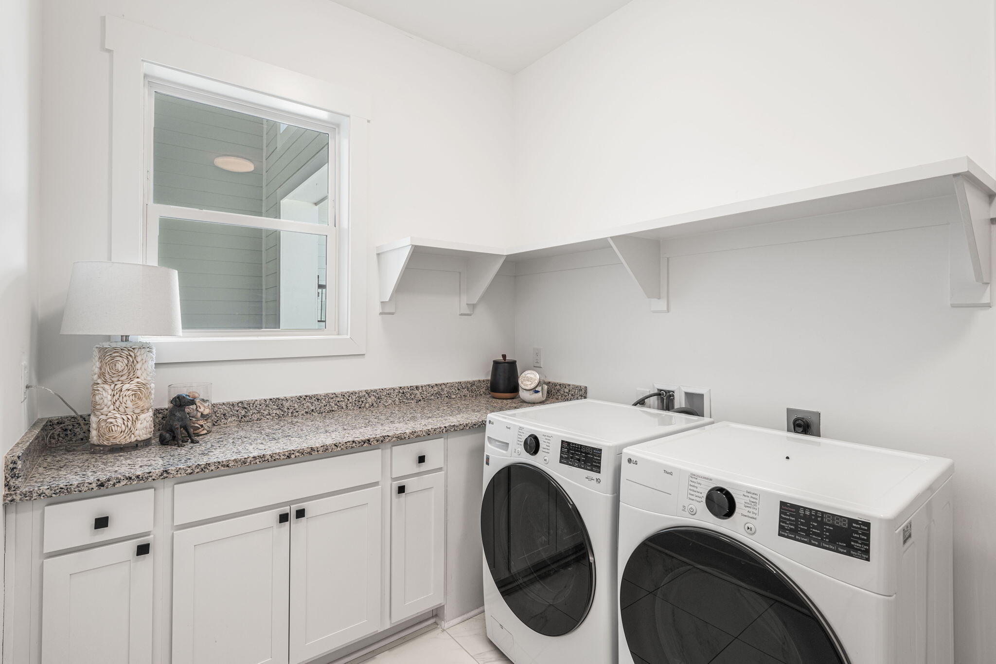 425 Lafayette Road Watersound, FL 32461 - Photo 38 of 52 a utility room with dryer and washer