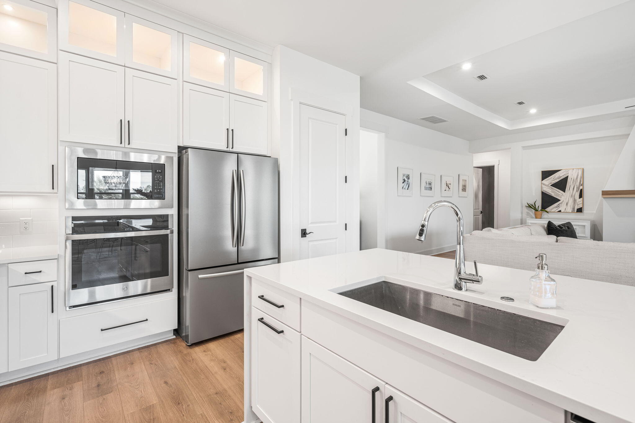 425 Lafayette Road Watersound, FL 32461 - Photo 7 of 52 a kitchen with a sink cabinets and stainless steel appliances