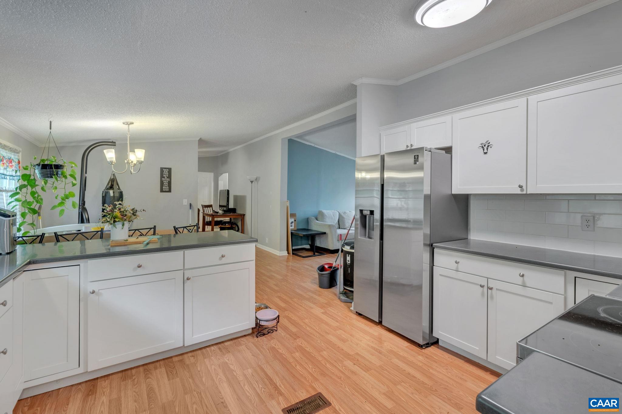 1826 Adial Road Faber, VA 22938 - Photo 17 of 39 a kitchen with stainless steel appliances a refrigerator sink and cabinets
