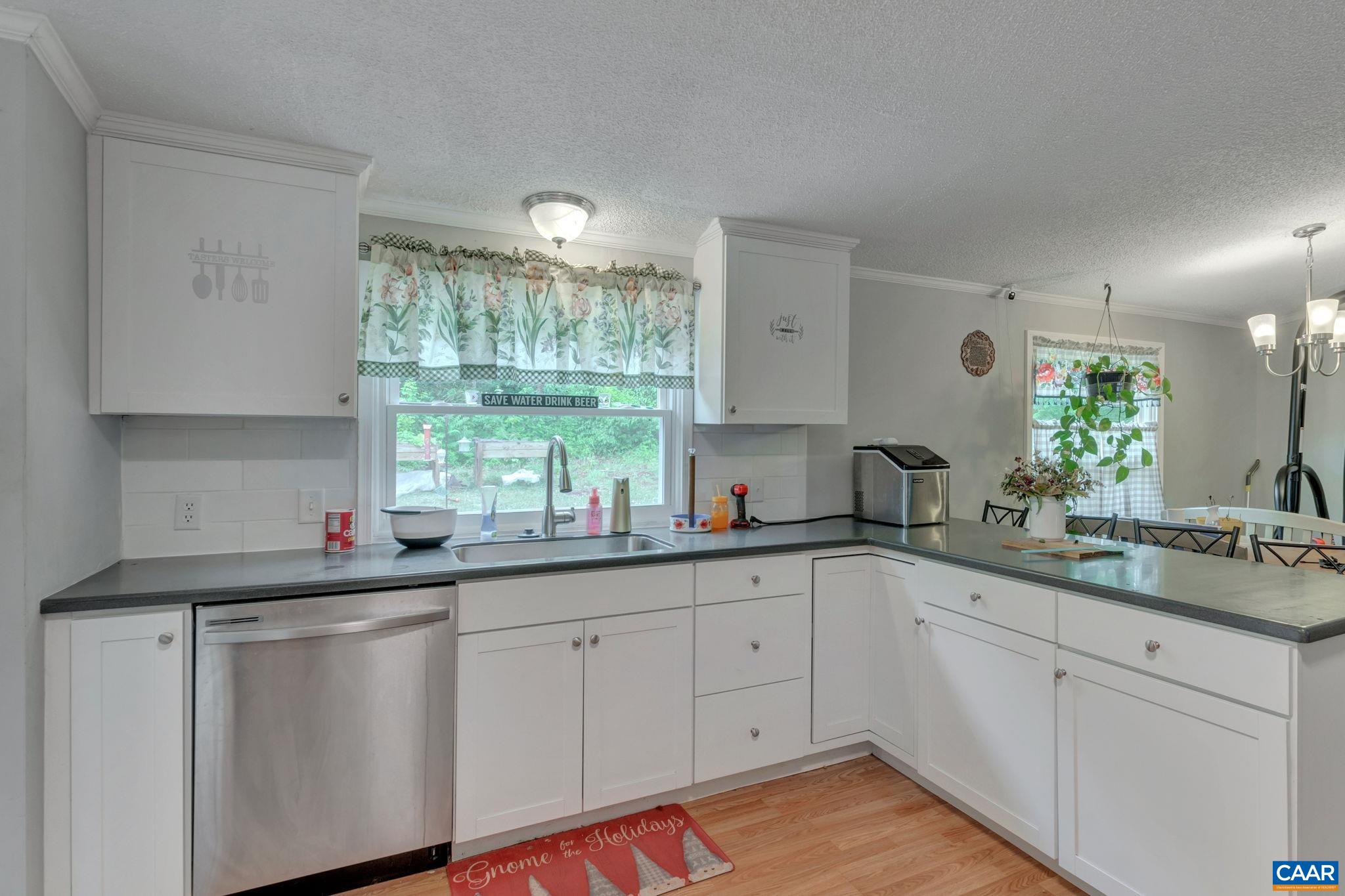 1826 Adial Road Faber, VA 22938 - Photo 18 of 39 a kitchen with a sink and cabinets