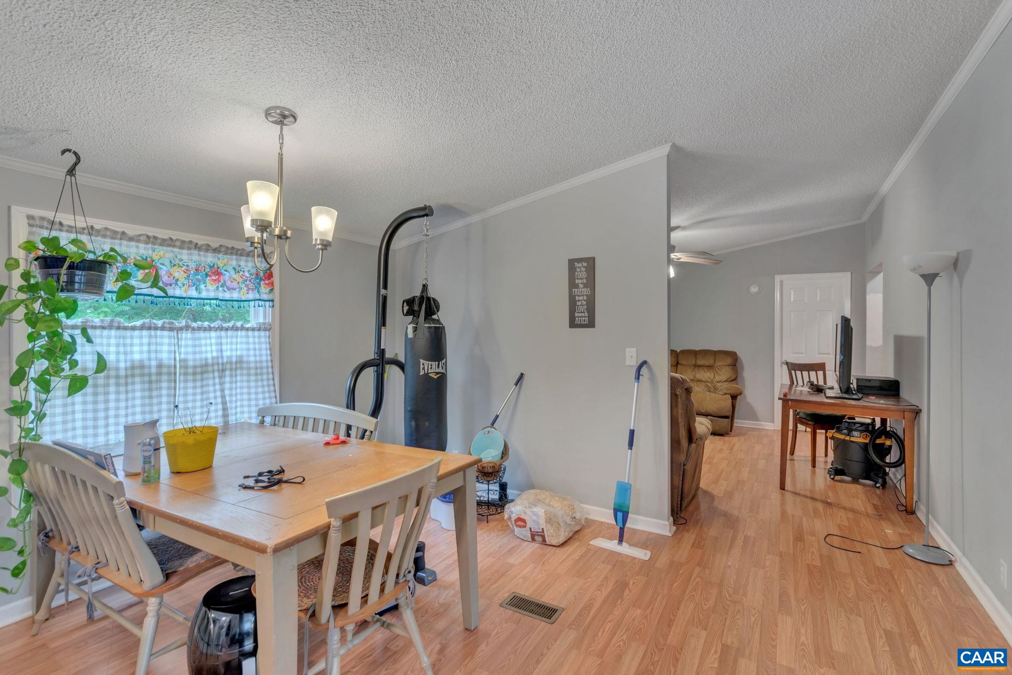 1826 Adial Road Faber, VA 22938 - Photo 20 of 39 a view of a dining room with furniture and wooden floor