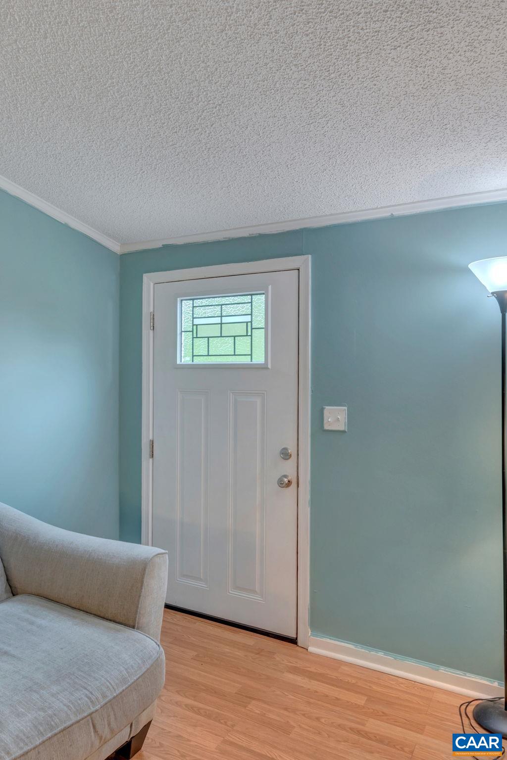 1826 Adial Road Faber, VA 22938 - Photo 2 of 39 a view of an empty room with wooden floor and a window