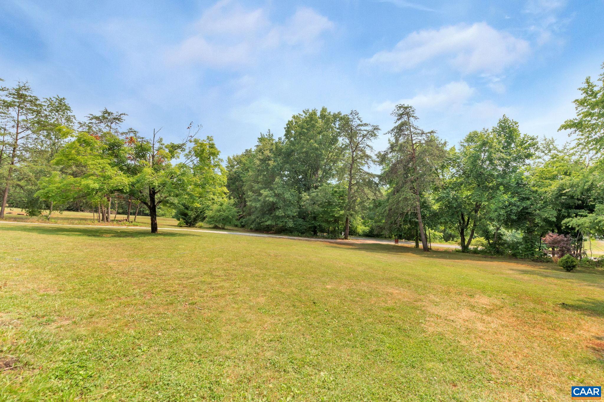 1826 Adial Road Faber, VA 22938 - Photo 35 of 39 a view of a swimming pool with an outdoor space and seating area