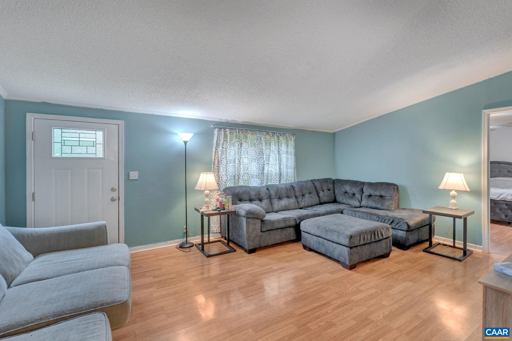 1826 Adial Road Faber, VA 22938 - Photo 5 of 39 a living room with furniture and a wooden floor