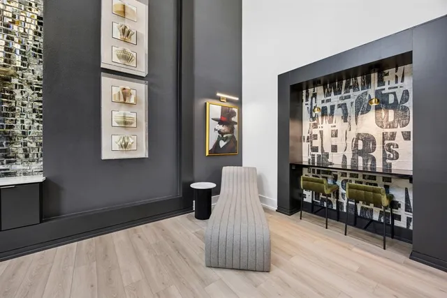 a bedroom with furniture and window