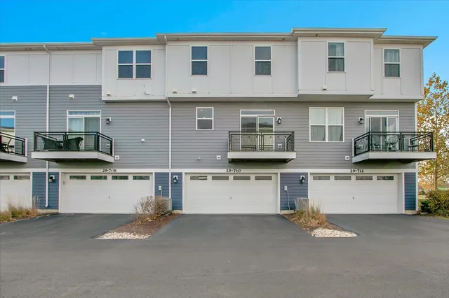 a view of a kitchen with granite countertop a stove top oven