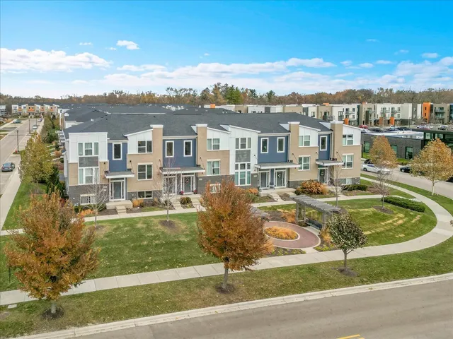 a swimming pool view with a outdoor seating