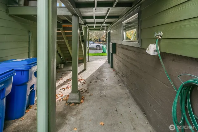 a view of a pathway of a house with backyard