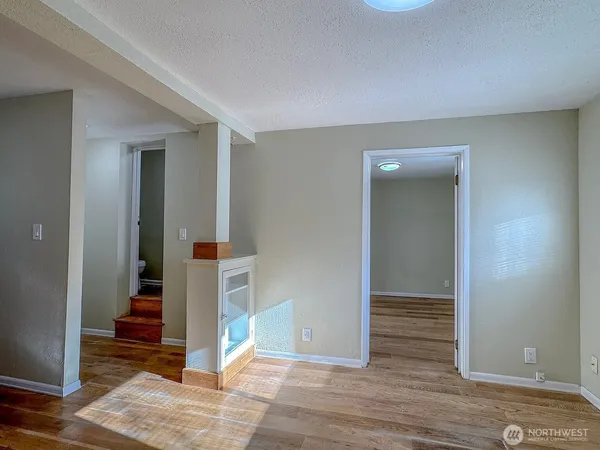 a kitchen with stainless steel appliances a refrigerator and a stove top oven
