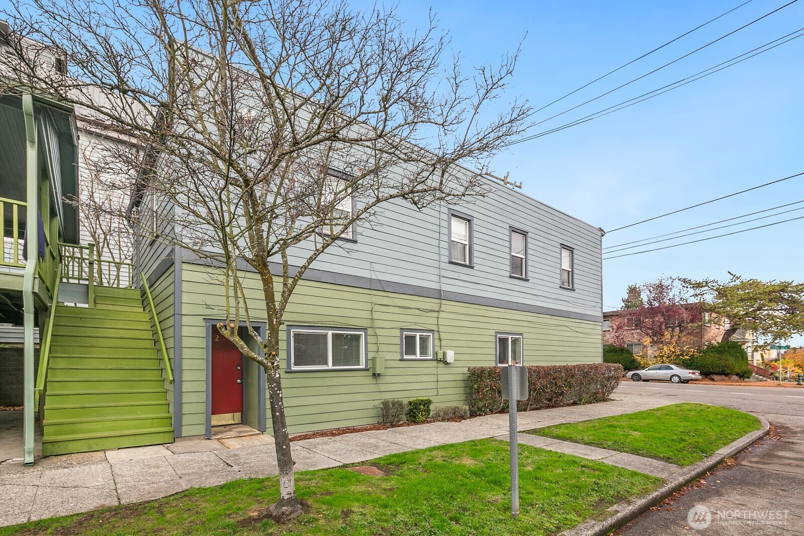 7103 Linden Avenue North, Unit 15 Seattle, WA 98103 - Photo 7 of 40 a view of a house with a yard