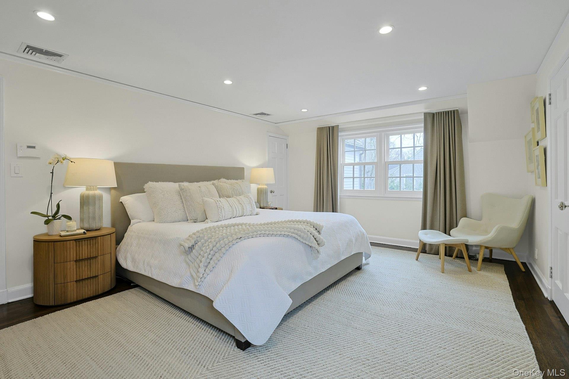 250 Mamaroneck Road Scarsdale, NY 10583 - Photo 17 of 35 Rest easy in this luxurious, serene primary suite featuring three walk in closets, one with additional storage.