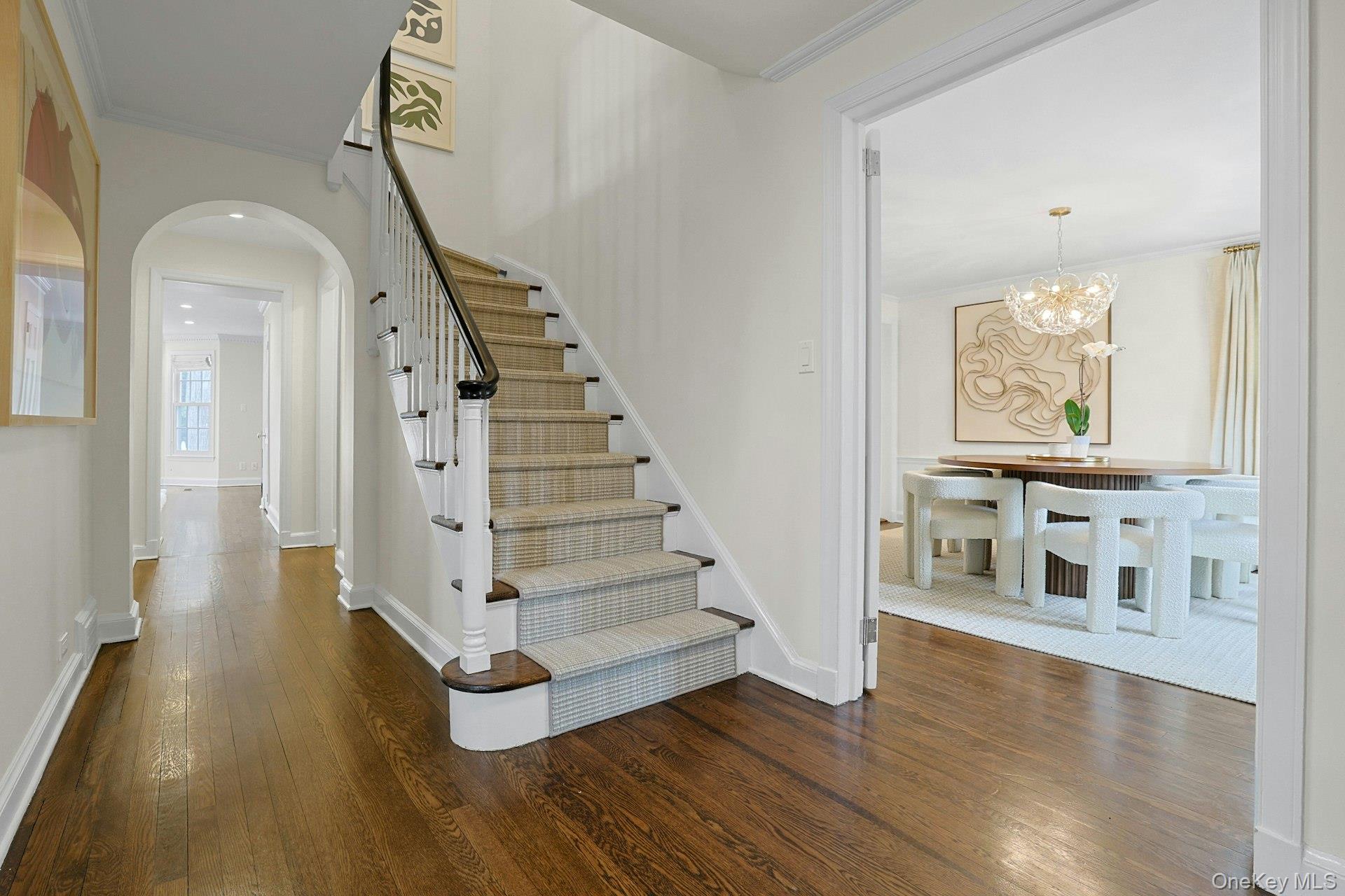 250 Mamaroneck Road Scarsdale, NY 10583 - Photo 2 of 35 Gracious foyer with a classic staircase and a seamless flow into the home’s main living spaces.