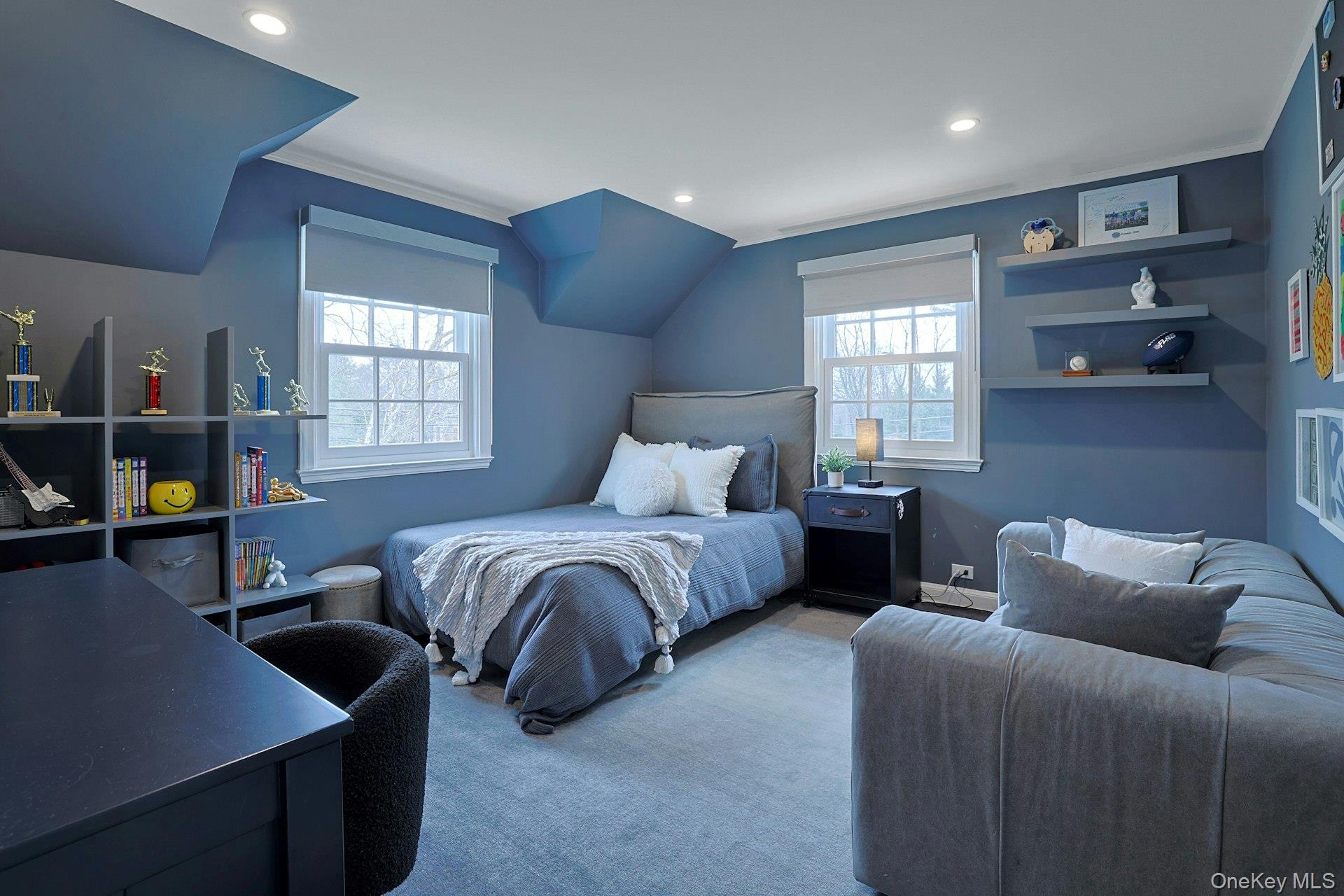 250 Mamaroneck Road Scarsdale, NY 10583 - Photo 21 of 35 First of three additional spacious bedrooms on the second level, featuring built-in shelving and a well-outfitted closet.