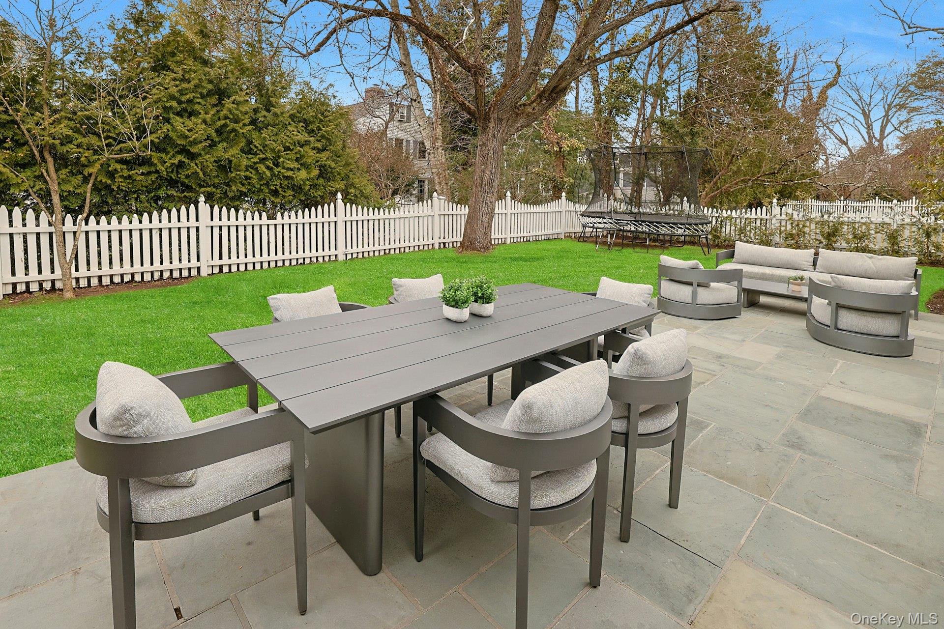 250 Mamaroneck Road Scarsdale, NY 10583 - Photo 30 of 35 Close-up of the outdoor dining and entertaining space, with an expanded and all new bluestone patio in 2023.