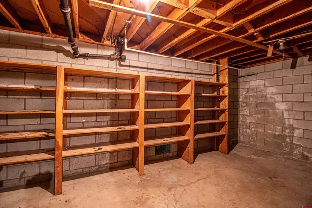 a view of a house with a snow in the yard