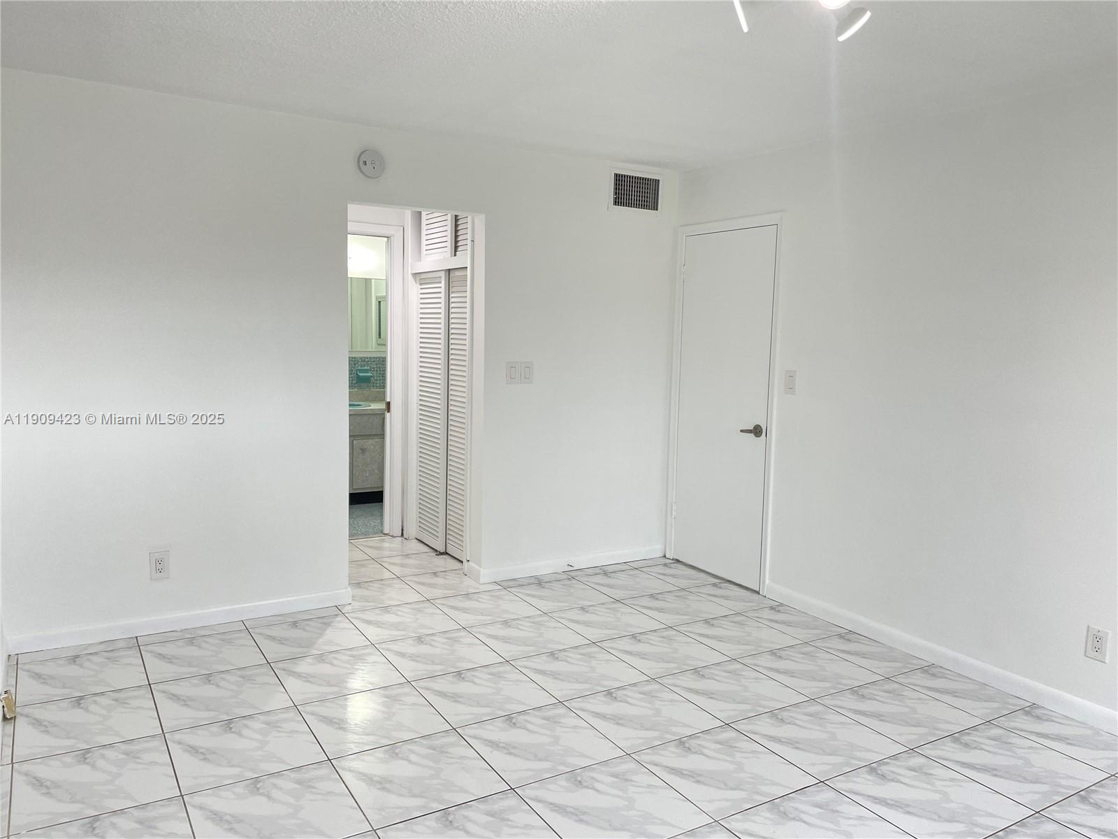 20201 Northeast 29th Court, Unit D221 Aventura, FL 33180 - Photo 11 of 13 a view of an empty room