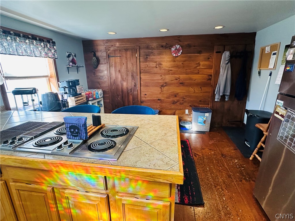 22 Scotch Hill Road Marcellus, NY 13108 - Photo 12 of 28 Bathroom door to the left and laundry room door to