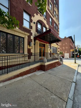 a view of a building with a porch