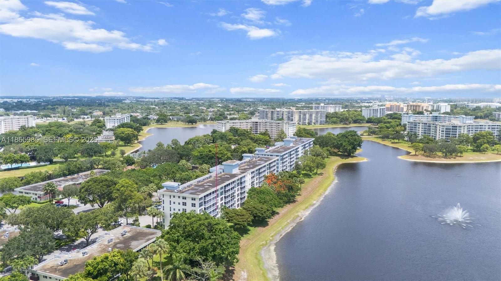 3150 North Course Lane, Unit 402 Pompano Beach, FL 33069 - Photo 24 of 29 a view of a city street view with lake view