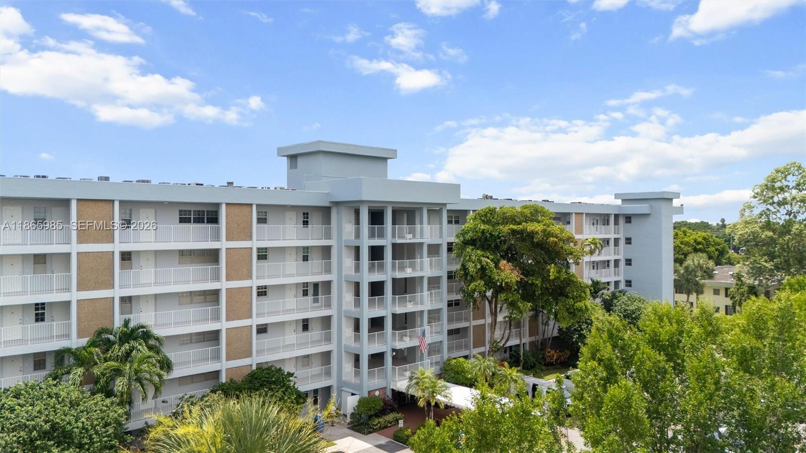 3150 North Course Lane, Unit 402 Pompano Beach, FL 33069 - Photo 26 of 29 a view of a residential apartment building