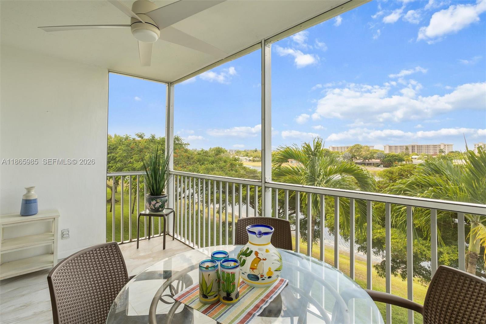 3150 North Course Lane, Unit 402 Pompano Beach, FL 33069 - Photo 7 of 29 a view of a balcony with furniture