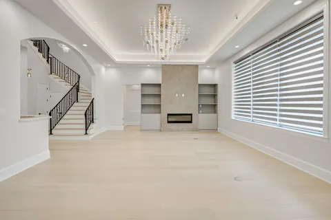 a kitchen with a stove and a refrigerator