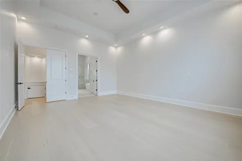 a white bath tub sitting in a bathroom