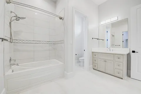 a room with gym equipment and a large mirror