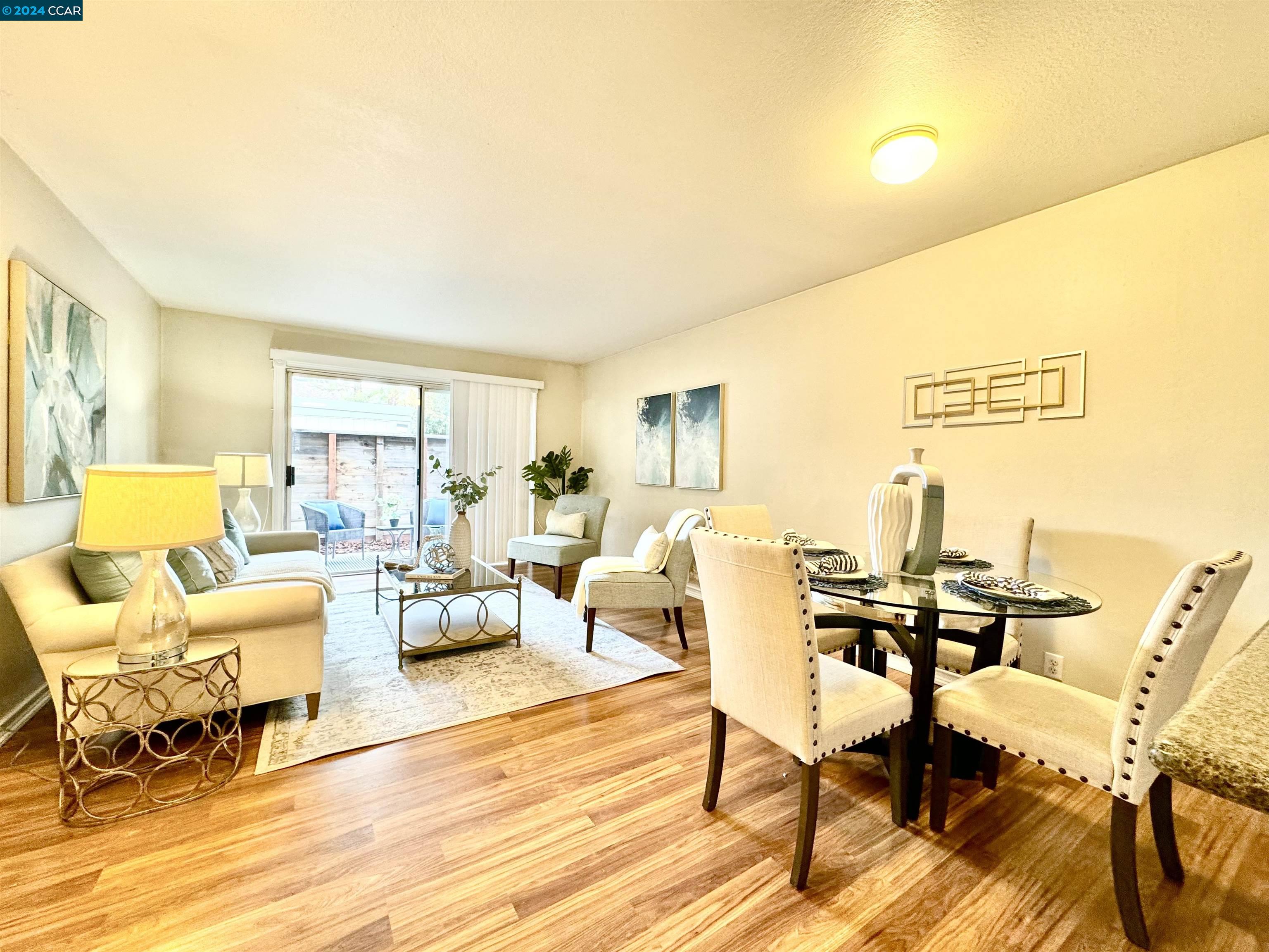 a living room with furniture and a table