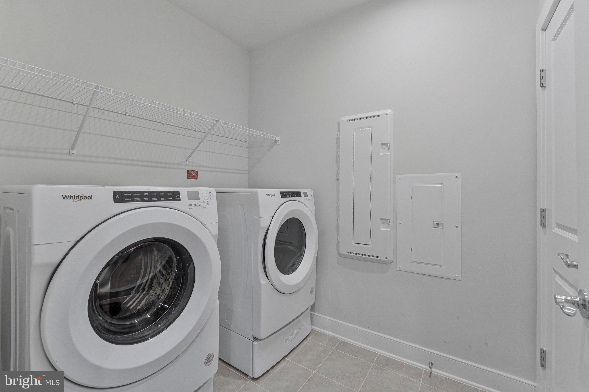 2320 Field Point Road, Unit 4304 Herndon, VA 20171 - Photo 22 of 42 a utility room with dryer and washer