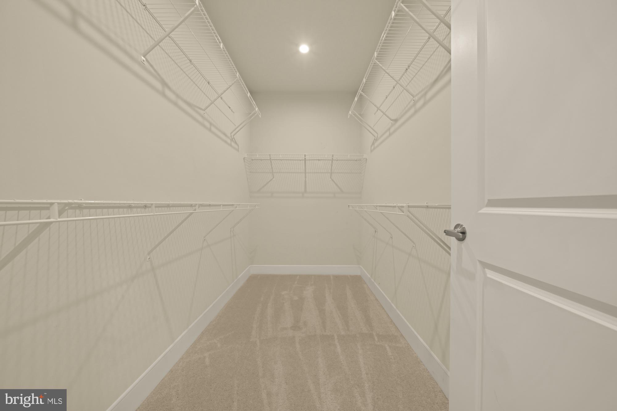 2320 Field Point Road, Unit 4304 Herndon, VA 20171 - Photo 27 of 43 a view of a room with racks on the wall